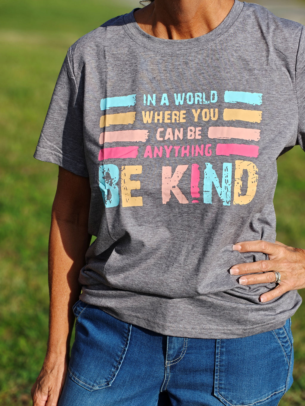 In A World Where You Can Be Anything, Be Kind" Women’s Light Gray Tee – Size Large