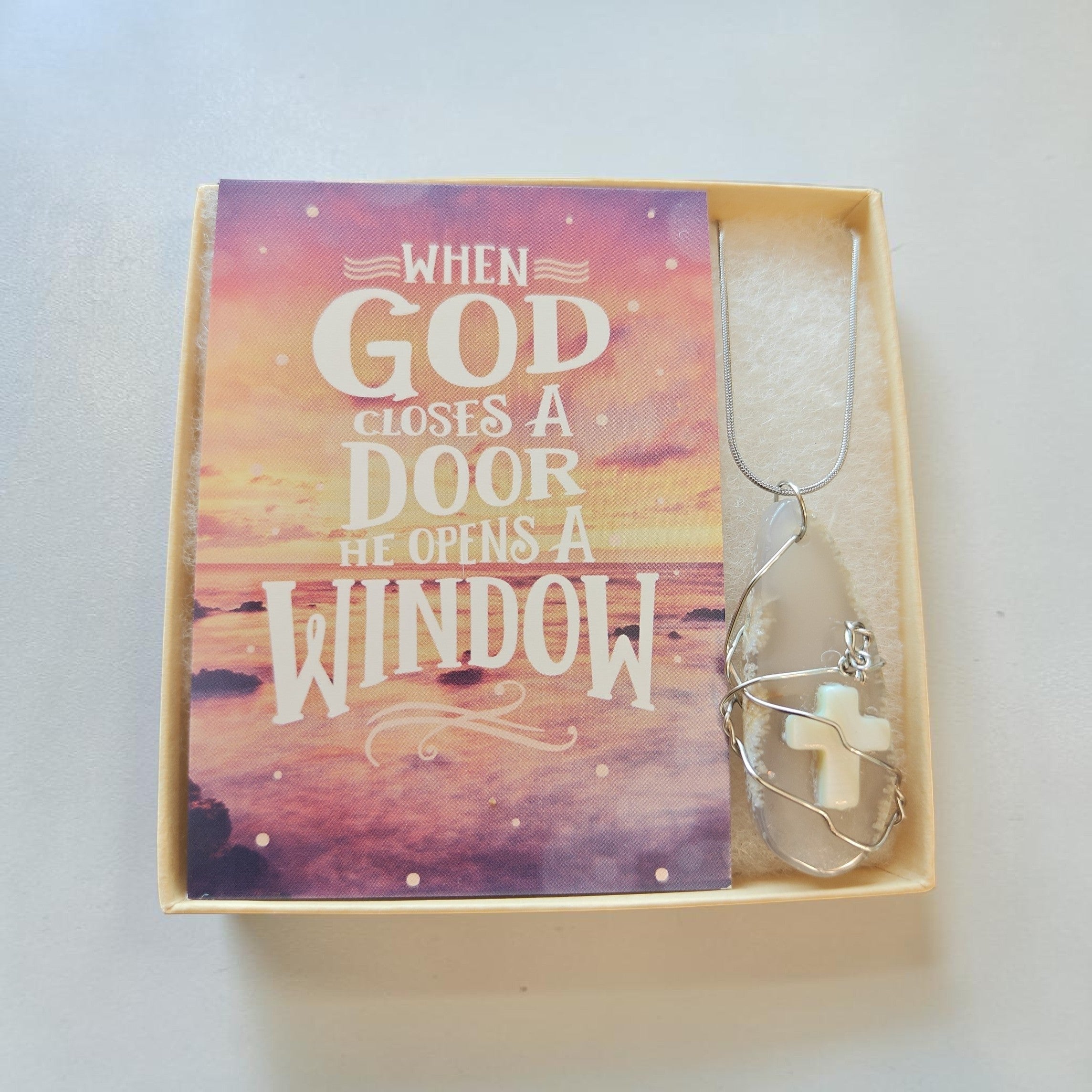 Handcrafted Wire-Wrapped Clear Stone Necklace with Cream Cross Accent