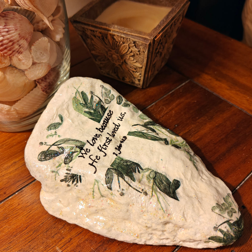 "We Love Because He Loved Us" Hand-Decorated Shell – Green Leafy Cross – 1 John 4:19 Scripture Art