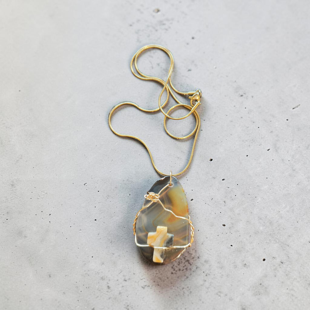 Wire-Wrapped Natural Yellow & Black Swirl Stone Cross Pendant
