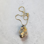 Wire-Wrapped Natural Yellow & Black Swirl Stone Cross Pendant