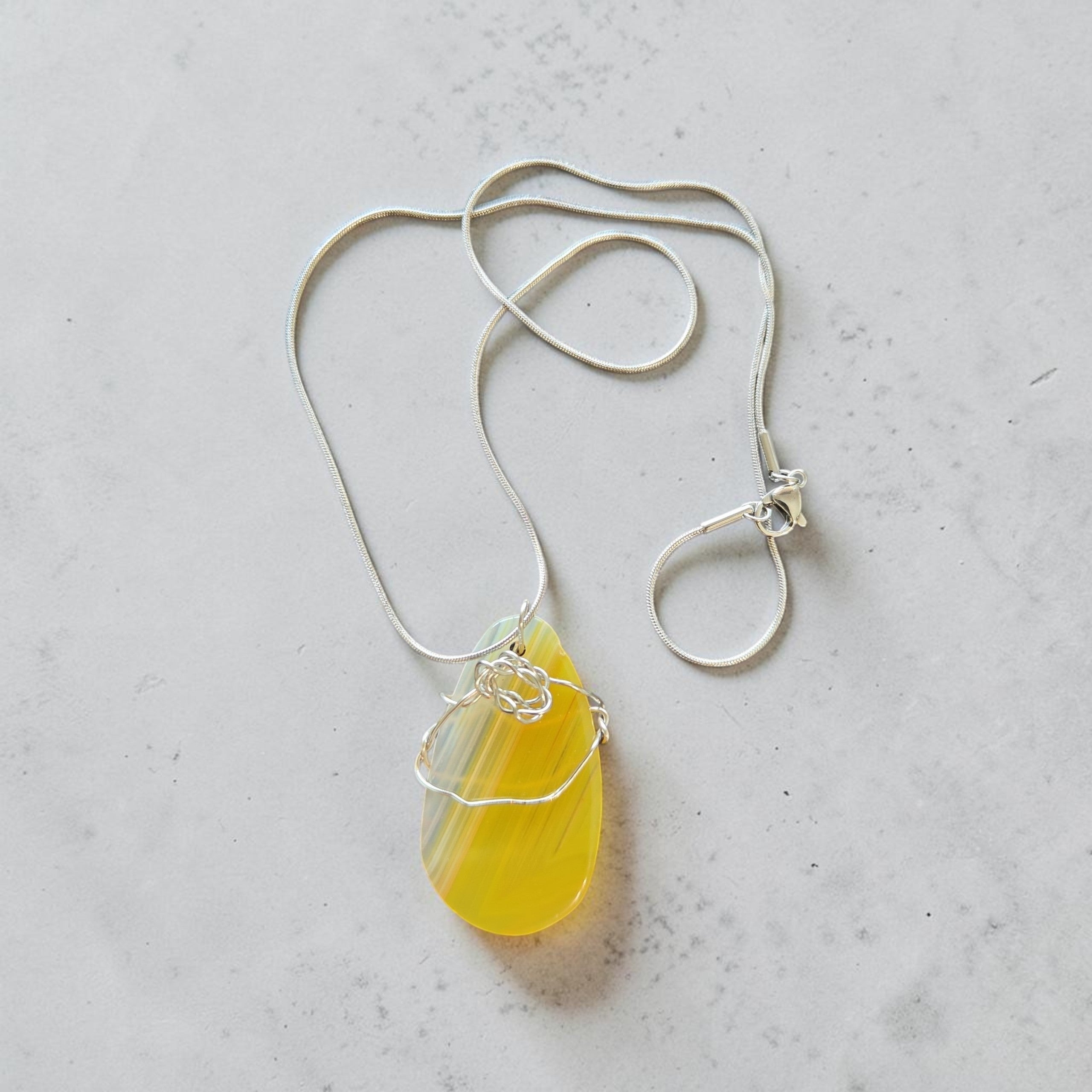 Radiant Yellowstone & Clear Quartz Wire-Wrapped Pendant in Stainless Steel