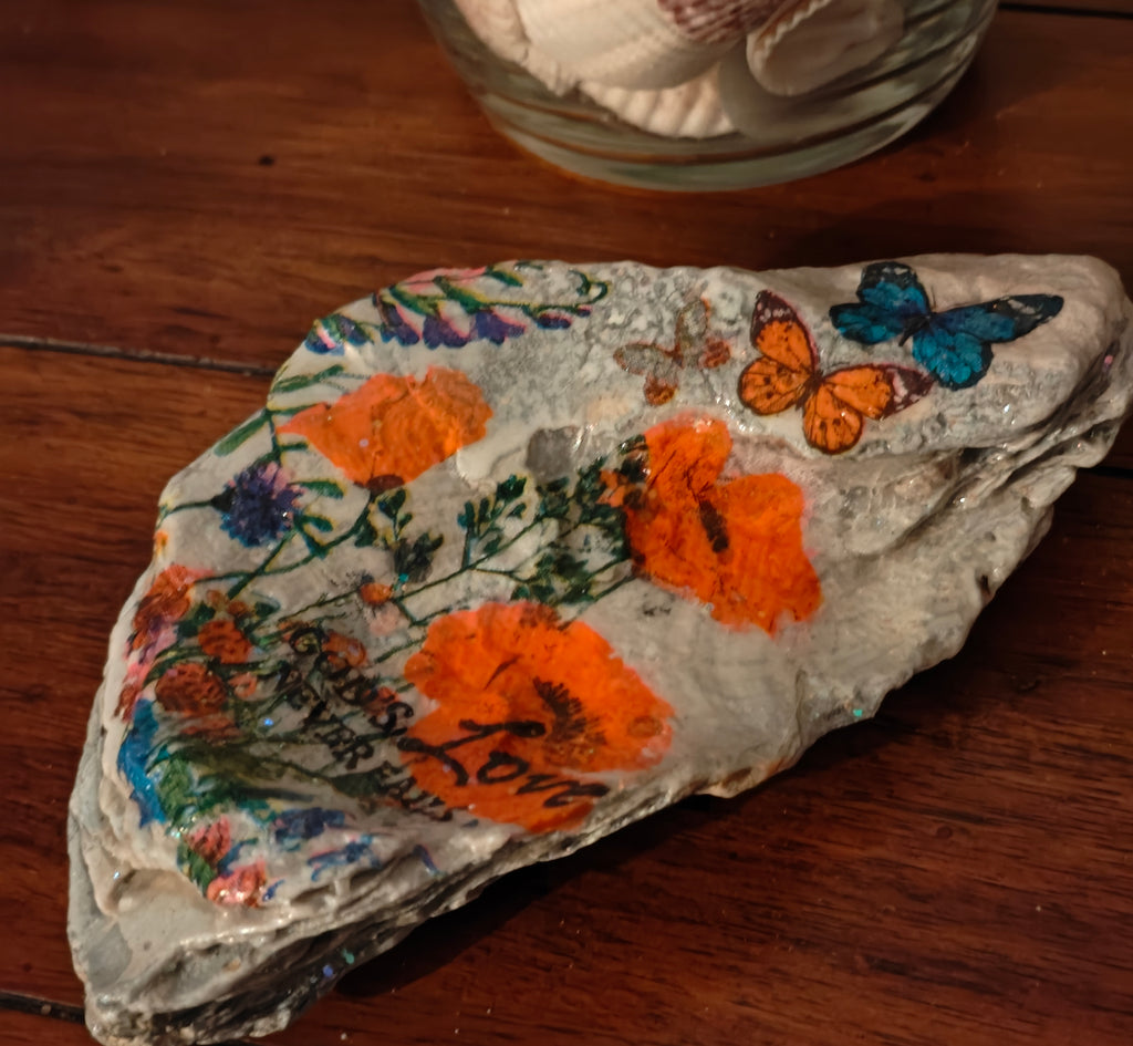 God's Love Never Fails" Hand-Decorated White Shell – Orange Floral & Butterfly Decor