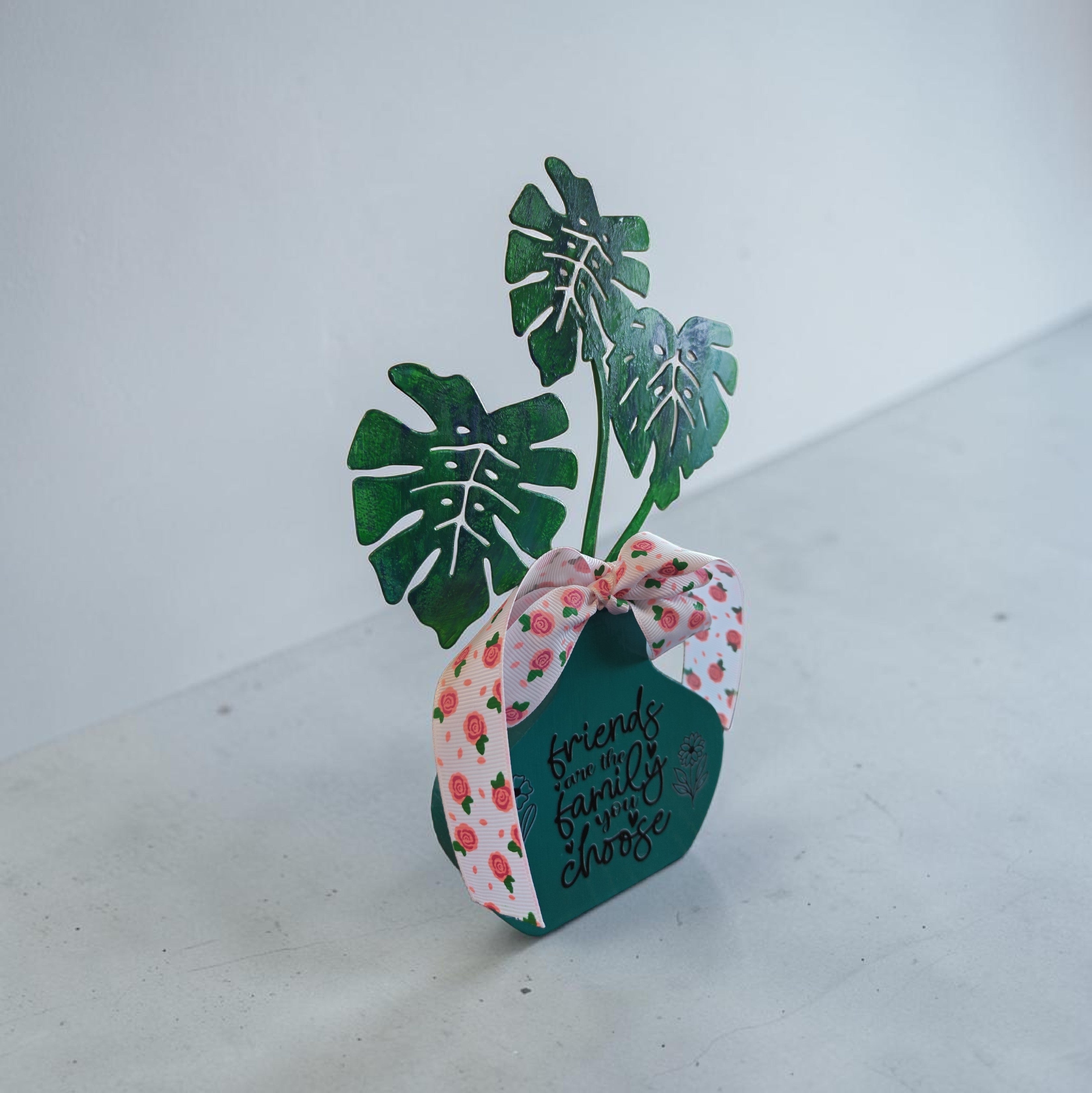 "Friends are the Family You Choose" Faux Plant Decor – Turquoise Wooden Pot with Pink Rose Bow