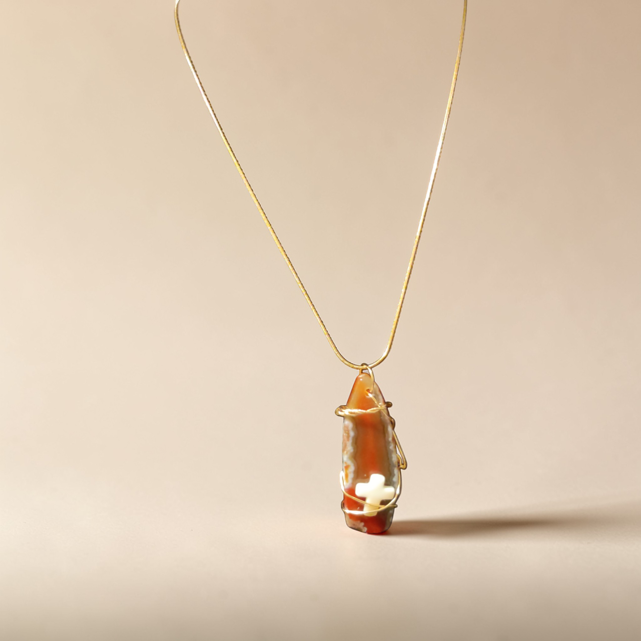 "Refiner’s Fire" – Gold-Wrapped Red Natural Stone & Cream Stone Cross