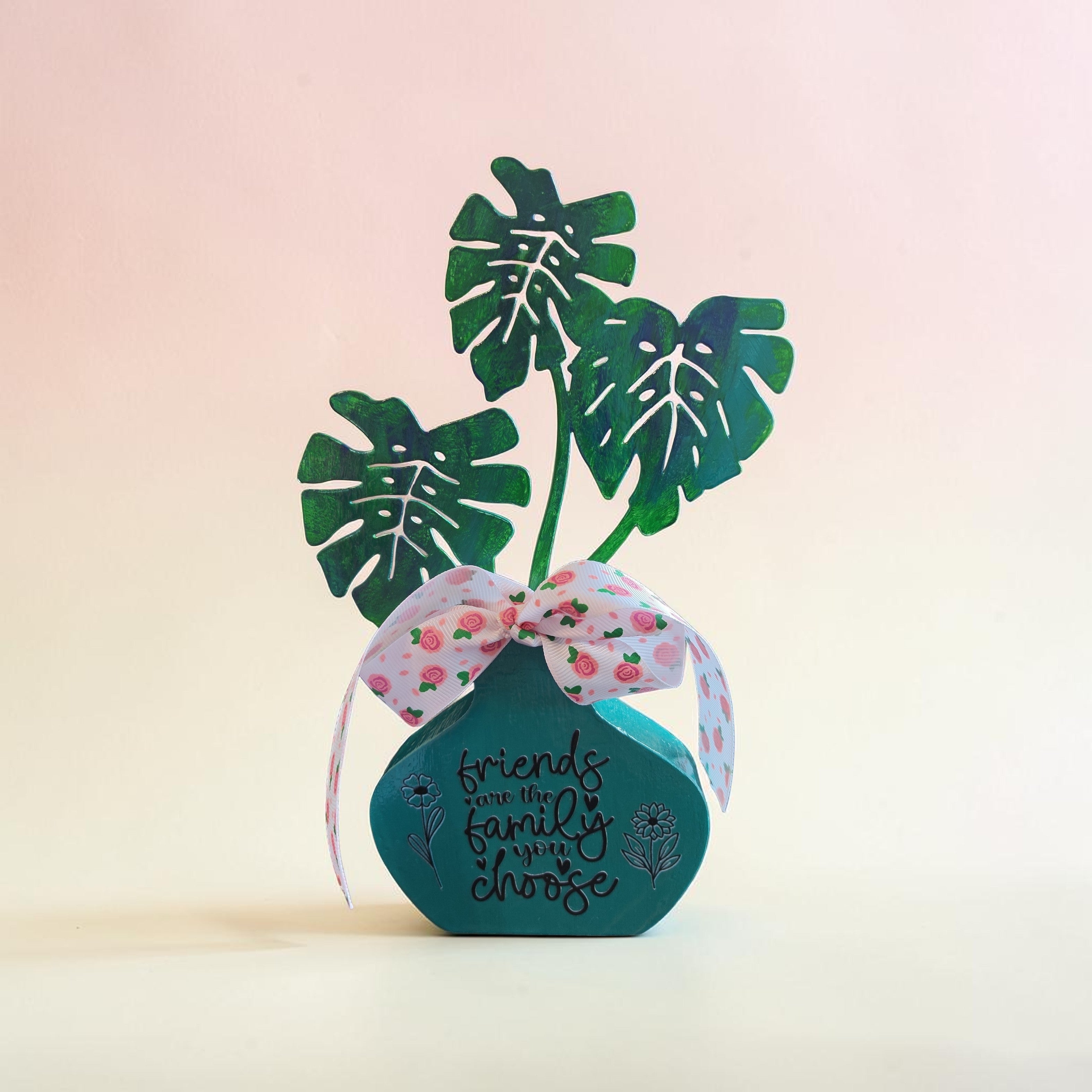 "Friends are the Family You Choose" Faux Plant Decor – Turquoise Wooden Pot with Pink Rose Bow