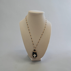 "Light of the Valley" Black & Tan Cross Necklace