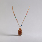The "Oil of Joy" Honey Stone Necklace.