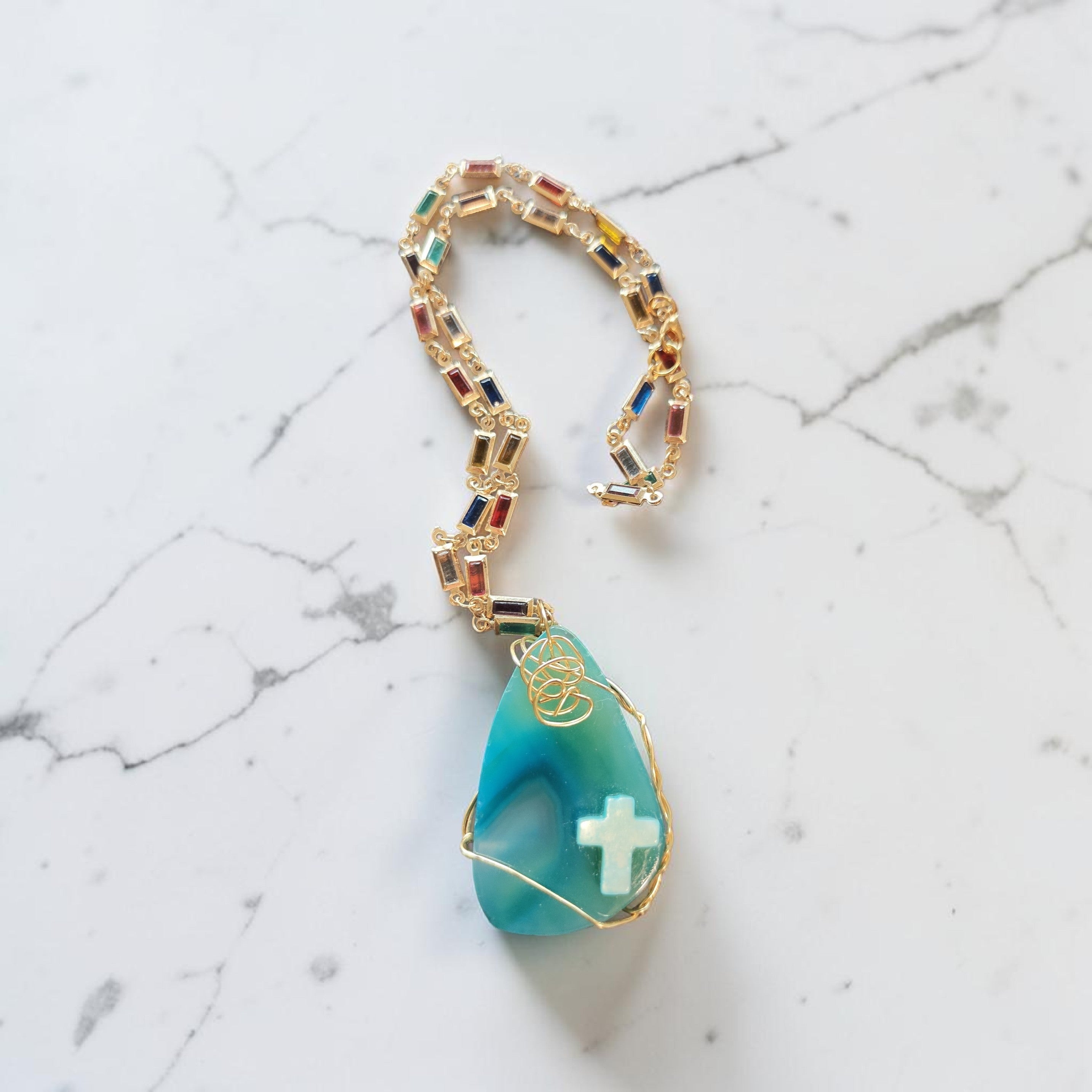 Handcrafted Multi-Tone Turquoise Cross Necklace in Gold Wire Wrap