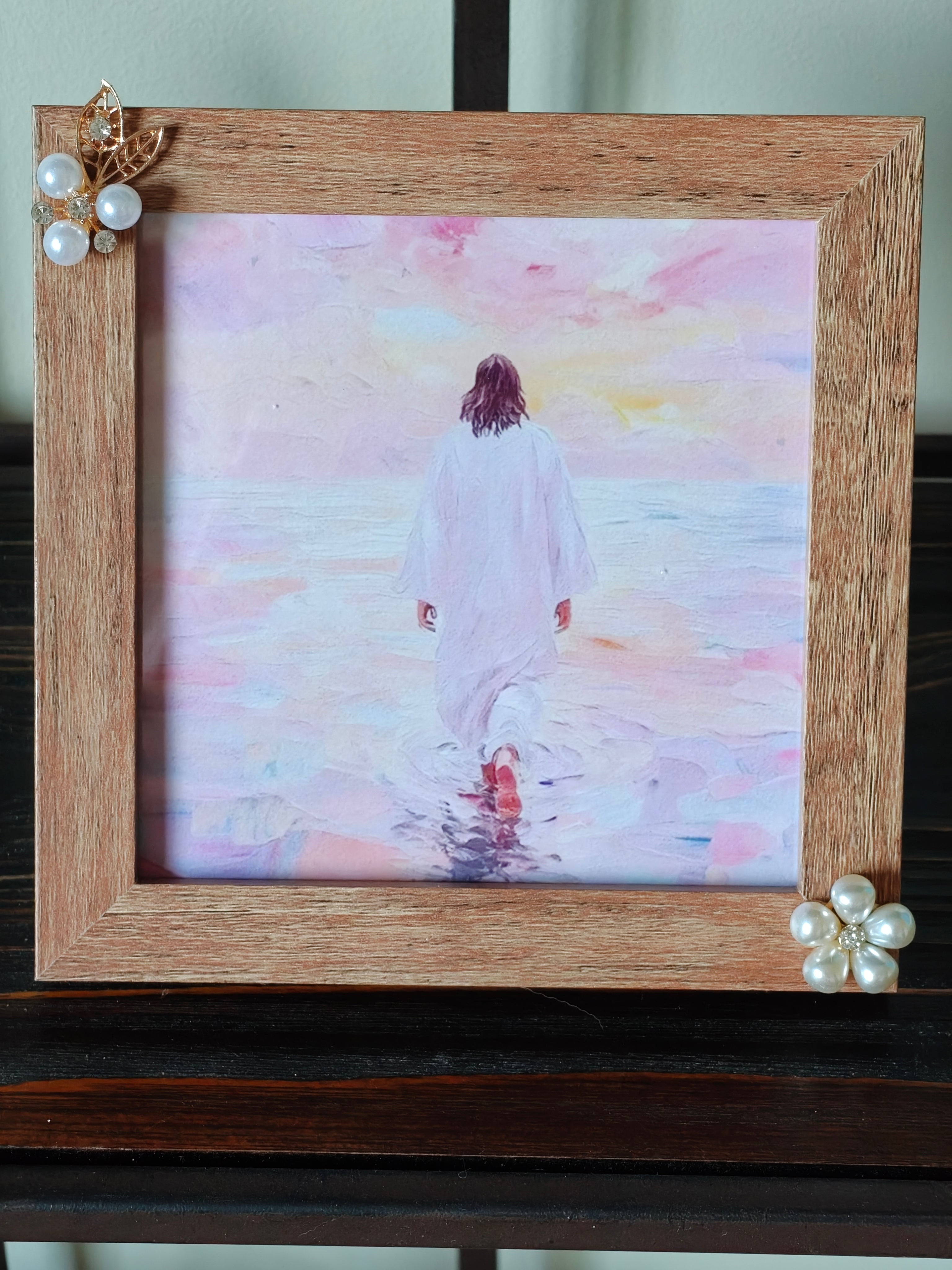“Framed pastel print of Jesus walking on the water.