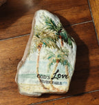 Coastal Faith Decor: "God's Love Never Fails" Decorated Rock