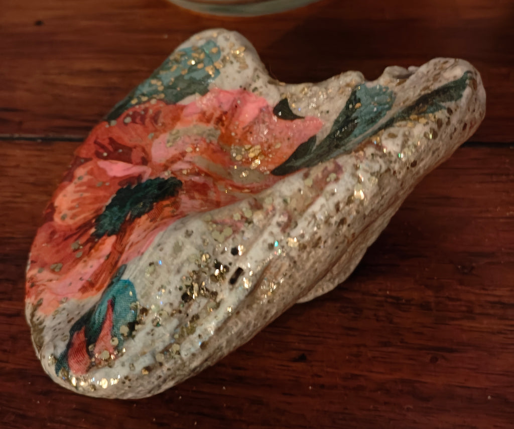 “Hand‑decorated off‑white natural shell featuring a beautiful pink flower design.