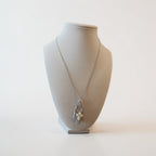 Handcrafted Wire-Wrapped Clear Stone Necklace with Cream Cross Accent