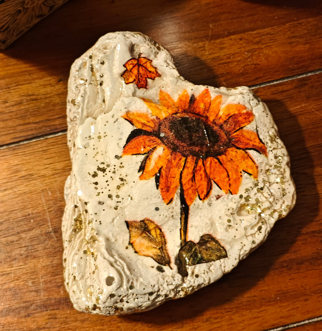 Beautiful hand-decorated shell featuring a sunflower design