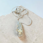 Handcrafted Wire-Wrapped Clear Stone Necklace with Cream Cross Accent