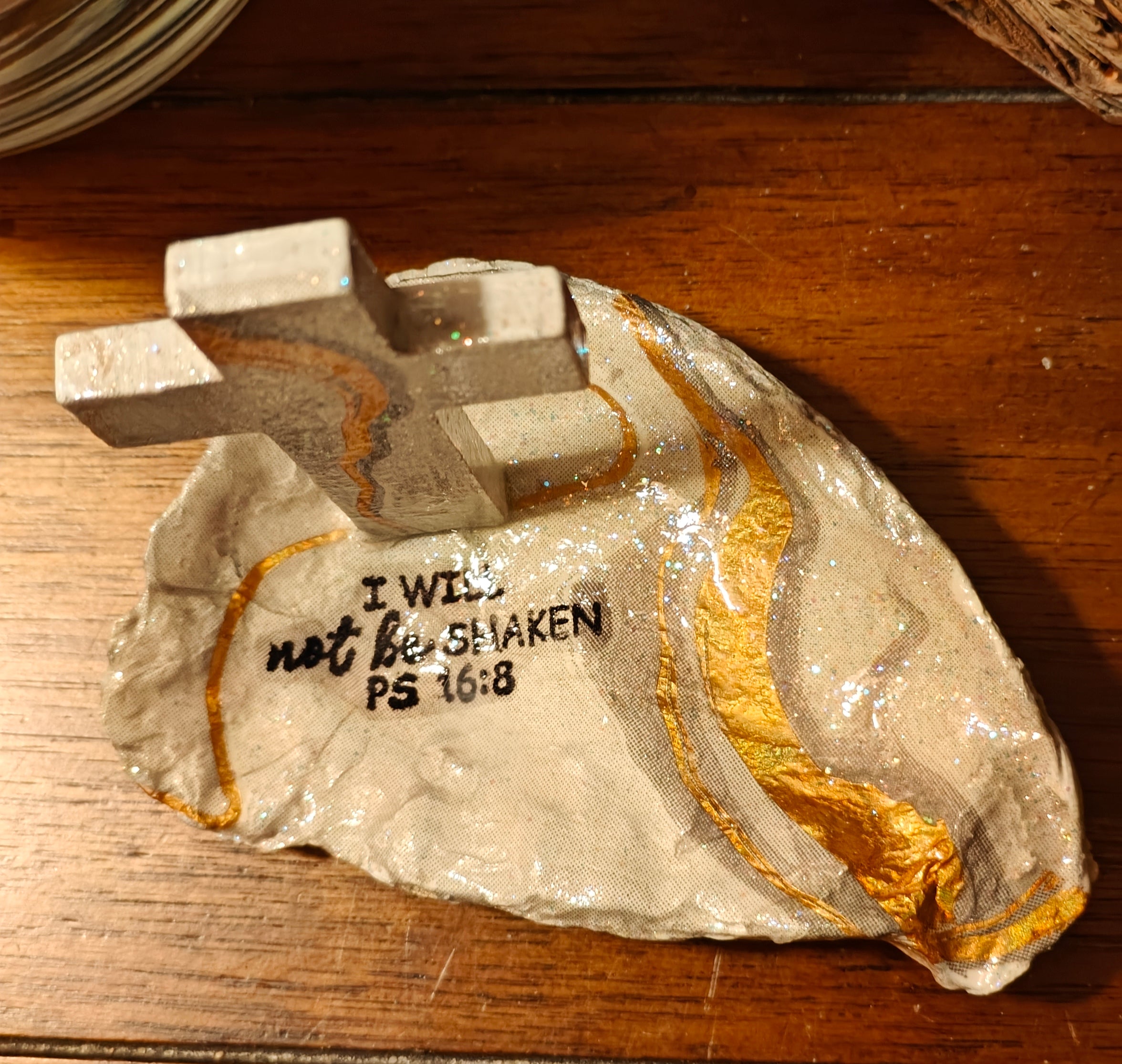 "I will not be shaken" hand-decorated shell with cross