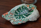 God Is Within Her" Hand-Decorated Shell – Bright Floral & Cross Design
