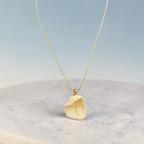The Sun-Kissed Inset Cross Necklace